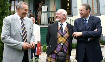 William Baxter, President of FILC sharing a joke with triple Olympic Champion Alexander Medved and Jacques Rogge President of The Olympic Commision